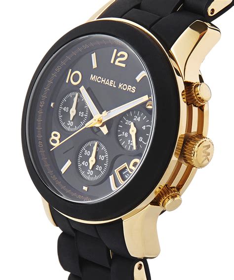 black and gold mk watch.